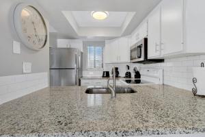 Great 1 bedroom 1 bath condo with heated pool