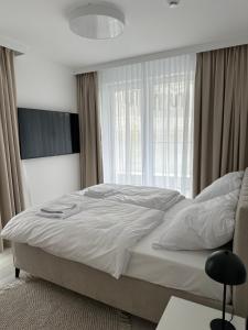 Rogowo Pearl Green Deluxe 2 sypialnie z widokiem na wydmę i na jezioro