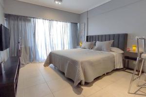 Technicolor Monoambiente con Balcon