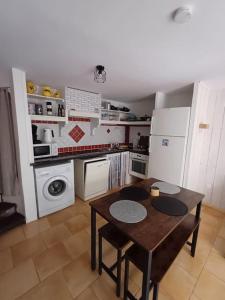 Appartements maison de village : photos des chambres