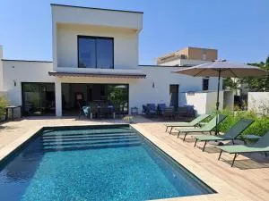 Chambre chez l'habitant dans Villa d'architecte avec Piscine chauffée - Marsillargues