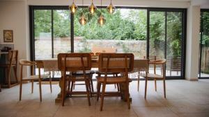 B&B / Chambres d'hotes Nouveau au coeur de l-Isle Adam - Le Clos de l-Isle : photos des chambres