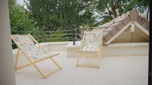 B&B / Chambres d'hotes Nouveau au coeur de l-Isle Adam - Le Clos de l-Isle : photos des chambres