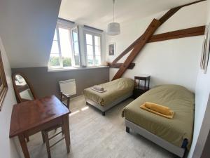 Appartements Le Grimaubois : photos des chambres