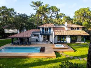 Villa de luxe avec piscine chauffée, jacuzzi, sauna au cœur de la forêt des Landes - FR-1-791-24