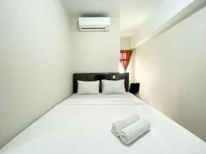 Elegant and Comfy 2BR Springlake Summarecon Bekasi Apartment near Summarecon Mall By Travelio