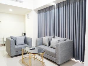 Spacious and Comfortable 3BR Vida View Makassar Apartment By Travelio