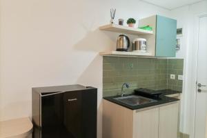 Cozy Studio at Barsa City Apartment By Travelio