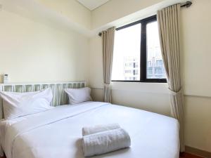 Comfort Stay 2BR at Meikarta Apartment By Travelio