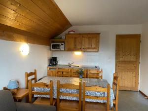 Appartements travelski home classic - Les Chalets de la Fontaine du Roi : photos des chambres