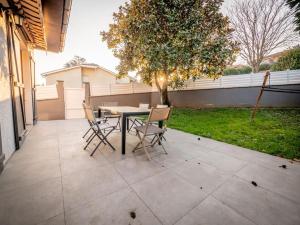 Villas Jolie Villa avec jardin : photos des chambres