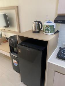 Homey Living Studio at Pollux Chadstone Apartment By Travelio