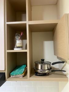 Homey Living Studio at Pollux Chadstone Apartment By Travelio