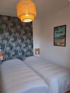 Maisons de vacances Belle maison proche centre ville et plage (3,5km) : photos des chambres