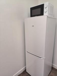 Appartements Studio cosy TV Netflix Proche Stade de France : photos des chambres