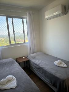 Apartamento pé na areia