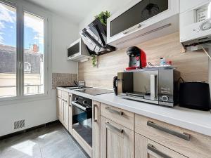 Appartements Le 4-F2 centre historique : photos des chambres
