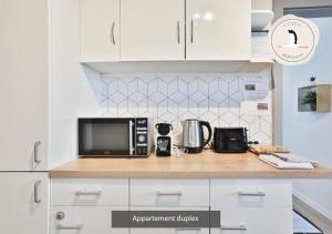 Appartements duplex 3 et 4 personnes - Climatisation - Village elu parmi les 
