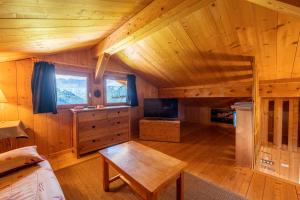 Chalets Le Paccaly, Piscine et Aire de jeux : photos des chambres