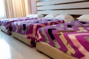 Infinity Suites triple room 203