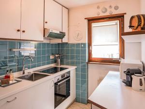 Apartment Chesa Arlas D2 by Interhome