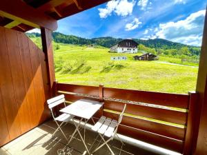 Duplex 3 chambres au pied des pistes avec piscine et parking - FR-1-505-205