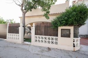 Cómodo chalet en la playa con gran patio exterior cerca del MET Y Campo de Golf