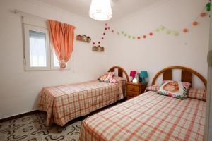 Cómodo chalet en la playa con gran patio exterior cerca del MET Y Campo de Golf