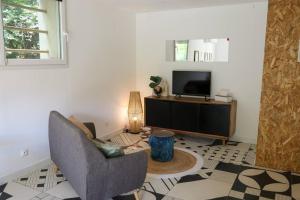Appartements Appartement rez-de-chaussee et patio : photos des chambres