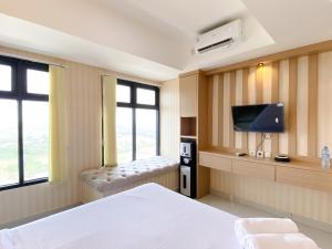 Best Spacious and Homey 2BR at Meikarta Apartment By Travelio