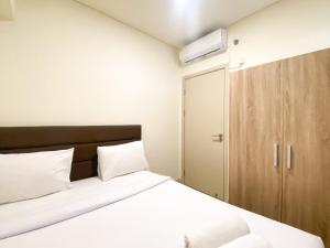 Best Spacious and Homey 2BR at Meikarta Apartment By Travelio