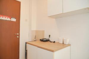 Best Choice and Homey Studio Tifolia Apartment By Travelio