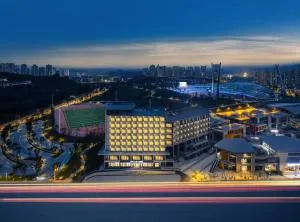 重庆合川体育中心轻居酒店 - 广安市