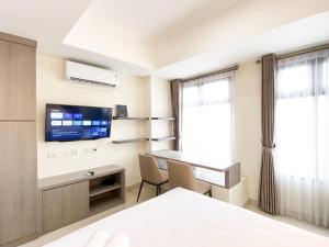 Cozy Living Studio at Pollux Chadstone Apartment By Travelio