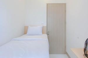 Cozy and Well Designed 2BR Tokyo Riverside PIK 2 Apartment By Travelio