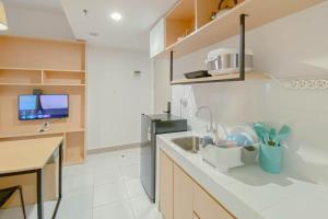 Cozy and Well Designed 2BR Tokyo Riverside PIK 2 Apartment By Travelio