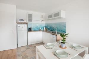 Face à Juno Beach - Appartement vue mer et port