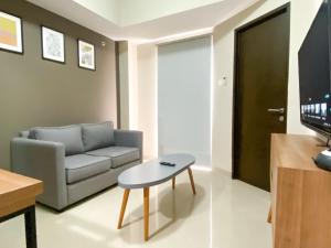 Good and Homey 1BR Apartment at Mustika Golf Residence By Travelio