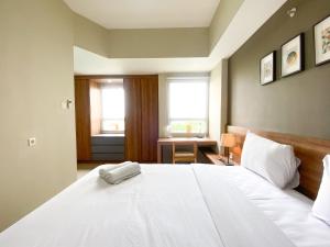 Good and Homey 1BR Apartment at Mustika Golf Residence By Travelio