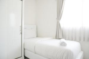 Modern and Homey 2BR at Signature Park Grande Apartment By Travelio