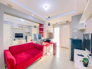Relaxing 2BR Bassura City Apartment By Travelio