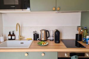 Appartements Les chevrons - Charme de l-ancien et modernite : photos des chambres