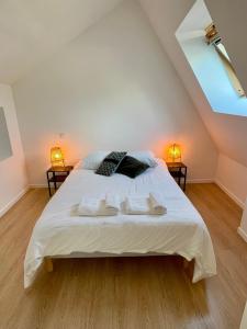 Appartements facon loft vaste T2 residence du haras : photos des chambres