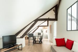 Appartements Le comble du bonheur : photos des chambres