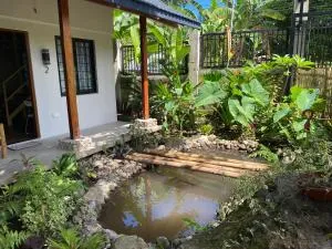 Under the mango tree at Klipp Residence - Talay