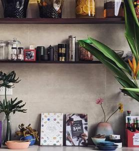 Here Library - A wooden home by the river with a library
