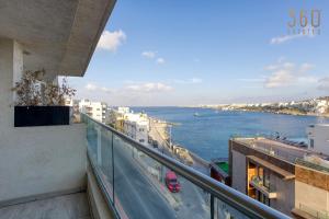 Waterfront 3BR home, with private balcony in Xemxija by 360 Estates