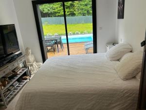 Sejours chez l'habitant Les Hermines a Plumelec : photos des chambres