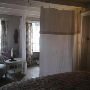 Maisons de vacances Maisonnette de bourg : photos des chambres