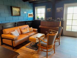 Onder de Blauwe Mantel